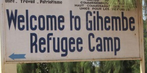 sign that points to the left and says welcome to Gihembe refuge camp