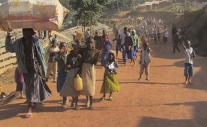 people carrying bags of food