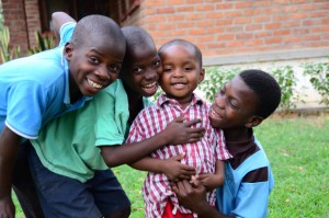 4 boys smiling