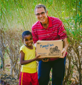 Malawi Kid getting a Manna Pack