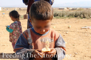 Lebanon boy eating bread