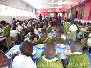 cafeteria full of children eating