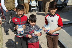 boys holding food