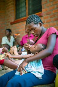 mother feeding her child